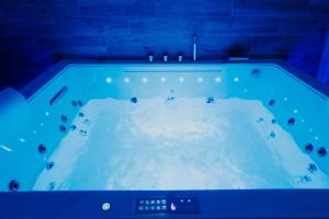 Appartements AppartSpa59 - Suite Tentation - Balneo, Sauna - Secret Room en option supplementaire : photos des chambres