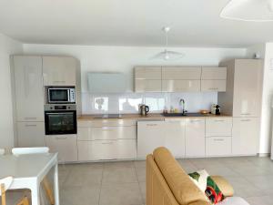 Appartements Plein Soleil : photos des chambres