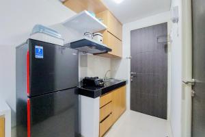 Homey and Cozy Studio Room Serpong Garden Apartment By Travelio