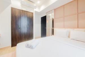 Modern Look and Cozy 1BR Branz BSD City Apartment By Travelio