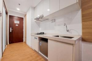 Wonderful Studio at Sky House BSD Apartment By Travelio