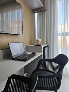 Studio com Piscina no Rooftop a 50m da praia