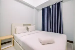 Well Furnished and Comfy 2BR at Royal Heights Apartment By Travelio - Sampal 2