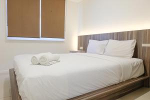 Strategic and Comfortable 1BR Apartment at Parahyangan Residence By Travelio