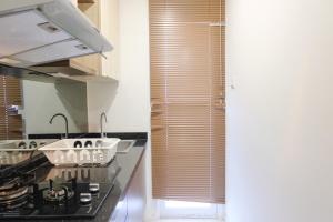 Strategic and Comfortable 1BR Apartment at Parahyangan Residence By Travelio