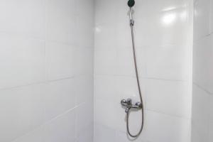 Comfort and Well Design Studio at Paltrow City Apartment By Travelio