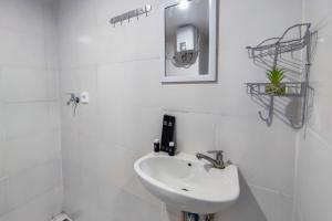 Comfort and Well Design Studio at Paltrow City Apartment By Travelio