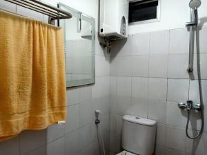 Apartement The Suites Metro by Pinkish