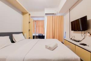 Cozy and Modern Studio at Serpong Garden Apartment By Travelio