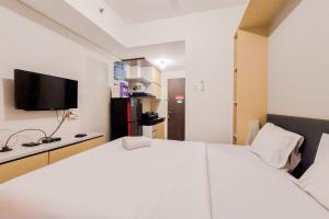 Cozy and Modern Studio at Serpong Garden Apartment By Travelio