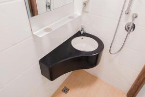 Great Deal and Comfortable Studio at Sky House BSD Apartment By Travelio