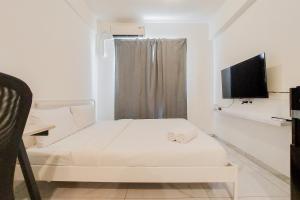 Simple and Cozy Stay Studio Sky House Alam Sutera Apartment By Travelio