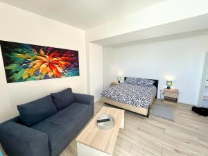 Appartements La passerelle - Climatise avec patio vue canal du midi : photos des chambres