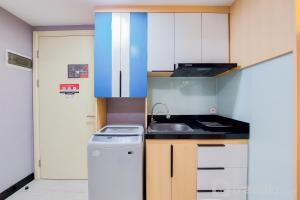 Scenic and Comfortable 2BR Apartment M-Town Residence By Travelio