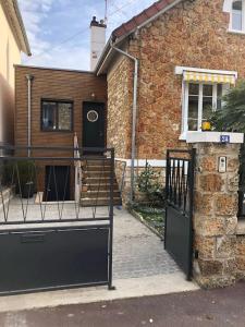 Villas Maison d-architecte Ermont a 20 minutes de Paris : photos des chambres