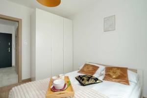 Jasny Apartament Blisko Lotniska Ławica w Poznaniu by Noclegi Renters