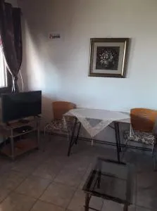 Το πέτρινο σπίτι στην πλατεία - Sykaminéa