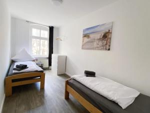 Top-Lage Apartments für 4 Personen, Premium mit Doppelbett oder Standard mit Einzelbetten