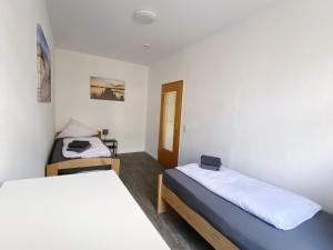 Top-Lage Apartments für 4 Personen, Premium mit Doppelbett oder Standard mit Einzelbetten
