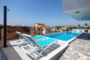 Apartman Oliva and Studio Delux for a family with swiming pool, free parking, terace with view at the sea