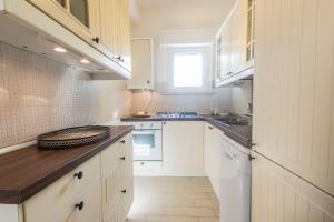 149 - Trilocale nuovo vista mare al Taunus, con barbecue e ampio giardino, ben arredato e climatizzato - SPIAGGIA inclusa nel prezzo