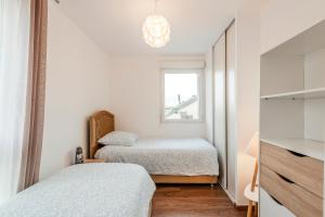 Appartements Le Havre du Bois Coquard - Proche Disney : photos des chambres