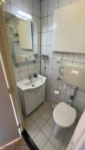 Klassiek appartement 300meter van duinen en strand