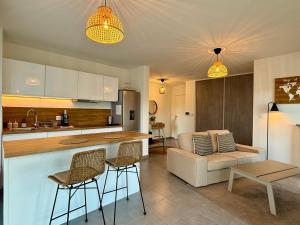 Appartements T3 avec balcon et parking prive : photos des chambres
