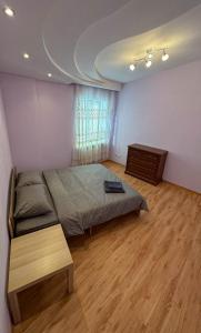 Двоповерхові автентичні апартаменти біля парку Шевченка