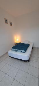 Appartements Location, 10 mn des plages. : photos des chambres