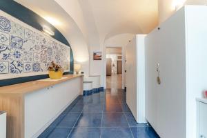 Open space letto Queensize con vista doccia