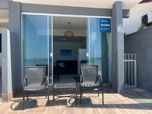 Pé na areia! Casa aconchegante frente mar! SV27H