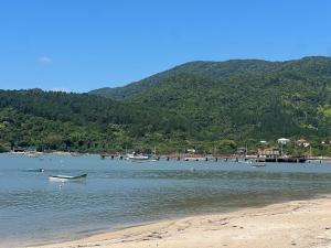 Pé na areia! Casa aconchegante frente mar! SV27H