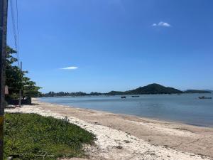 Pé na areia! Casa aconchegante frente mar! SV27H