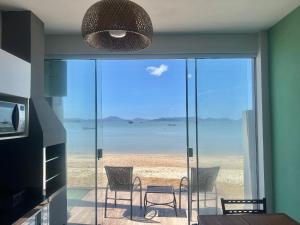 Pé na areia! Casa aconchegante frente mar! SV27H