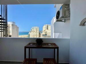Central Large Suite with Balcony & Beach view