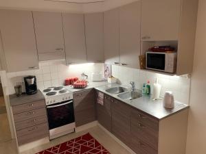 SUSIHUKKA & Punahilkka Apartments with sauna