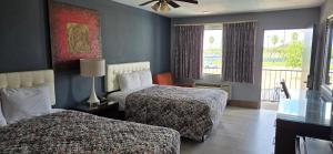 Queen Room with Two Queen Beds - Non-Smoking room in Deluxe Inn Airport