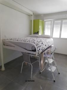 Appartements Le Repaire : photos des chambres