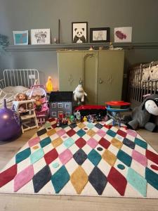 2-bedroom family apartment filled with toys