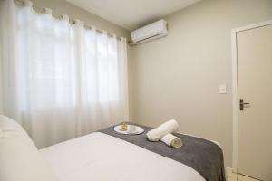 JOA23 - 1 Dorm, Climatizado, Garagem, TV Smart