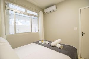 JOA23 - 1 Dorm, Climatizado, Garagem, TV Smart