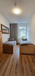Gästehaus Hirschstein - Hochwertige Ferienwohnung in sehr ruhiger Lage direkt am Fluss Göltzsch