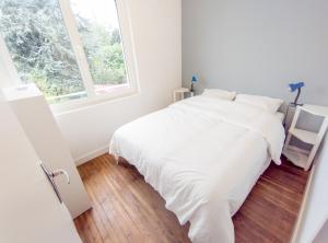 Maisons de vacances Maison a 10 min du centre dans avenue privee ! : photos des chambres