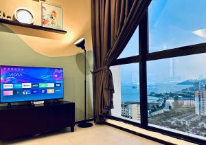 2 bed room 5 queen bed luxury sea view apartment - 4hvězdičkové hotely ve městě Jelutong