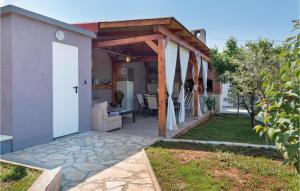 Two-Bedroom Holiday Home In Valtura