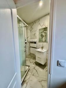 Appartements Appartement Cosy proche de Disney, Paris et Charles de Gaulle : photos des chambres