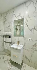 Appartements Appartement Cosy proche de Disney, Paris et Charles de Gaulle : photos des chambres