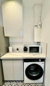 Appartements Appartement Cosy proche de Disney, Paris et Charles de Gaulle : photos des chambres