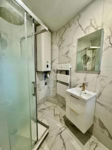 Appartements Appartement Cosy proche de Disney, Paris et Charles de Gaulle : photos des chambres